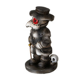 Statue of a character in a suit with a red eye and a skull on a white background