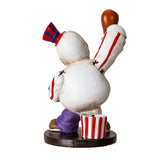 Decorative figurine of a snowman with a bowling pin on a white background