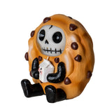 Skull design on a cookie with a white cat inside, on a white background
