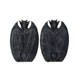 A pair of black bat-shaped wall decor pieces with textured wings and a heart-shaped cutout near the bottom, shown on a plain white background.