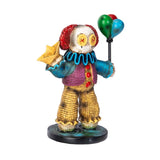 Colorful clown figurine with balloons on a white background