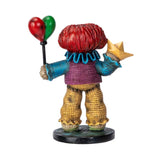 Corn husk character with balloons and a crown on a white background