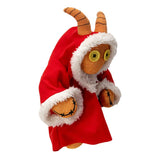 Stuffed toy with a red cape and horns on a white background