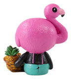Pink flamingo figurine with a pineapple on a white background