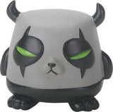 Gray creature figurine with black horns and green eyes on a white background