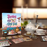 Tea-themed board game with teapot, cups, and cards on a table