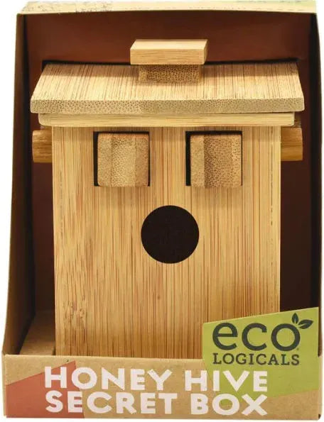 Wooden honey bee house with 'ecologics' branding on a cardboard box