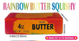 A colorful rectangular product package labeled 'RAINBOW BUTTER SQUISHY' with '4 OZ. SALTED BUTTER NET WT.