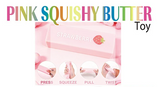 Pink squishy butter toy with a strawberry-themed box labeled 'STRAWBERRY' on a white background, with large multicolor text reading 'PINK SQUISHY BUTTER Toy' and four circular inset photos showing how to press, squeeze, pull, and twist the toy.