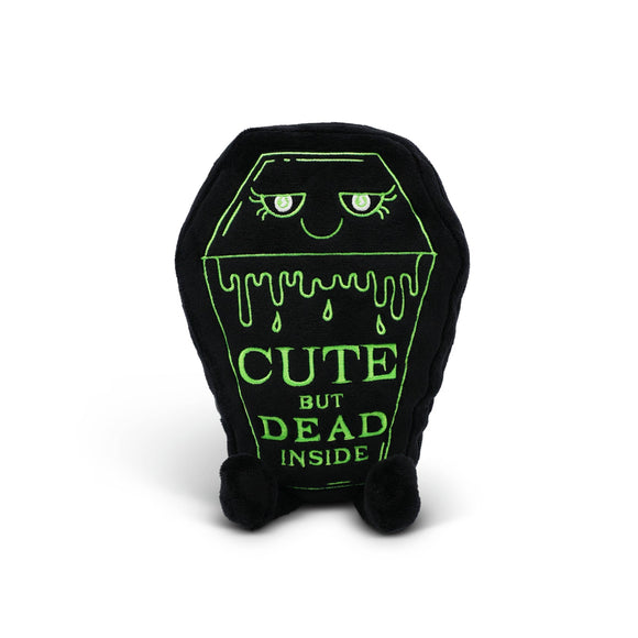 Black plush toy shaped like a coffin with green text on a white background