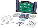 Wheel of Fortune game set with a green spinning wheel board, colorful prize wheel, play money, cards, and letter tiles on a white background.