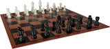 Chessboard with black and white chess pieces on a checkered board