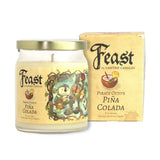 Feast by Cantrip Candles Pina Colada candle with packaging on a white background