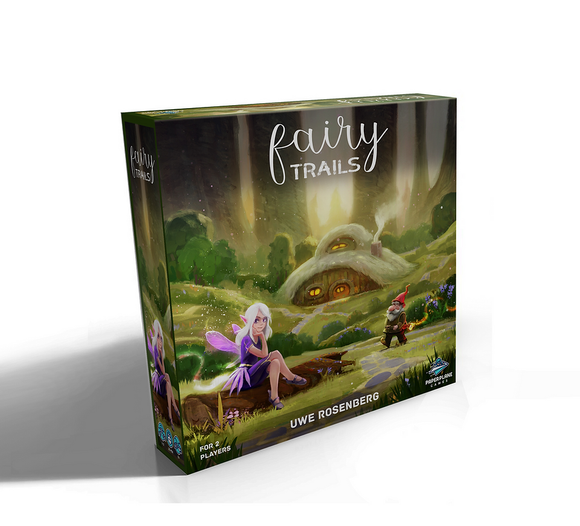Board game box titled 'Fairy Trails' with a fairy and mushroom design on a white background
