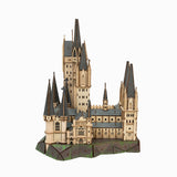 Model of a castle with multiple towers on a white background