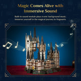 Wooden model of a castle with musical notes and text about immersive sound on a dark blue background