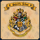 Hogwarts school crest with a yellow banner on a patterned background