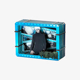 Anime character figurine in a blue display case with a white background