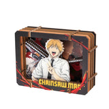 Anime character figurine in a display case with 'Chainsaw Man' branding.