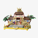 Toy building set with characters and architecture on a white background