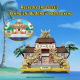 Toy model of a traditional Japanese building with characters on a blue sky background, promoting 'Tenkaichi Budokai' battle arena.
