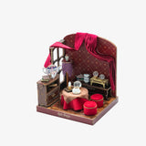 Miniature model of a room with furniture and decor, featuring 'Harry Potter' branding.
