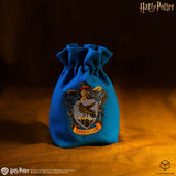 Blue drawstring bag with Ravenclaw crest on a dark background