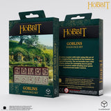 Two packaging boxes for 'The Hobbit' Goblins dice set on a white background