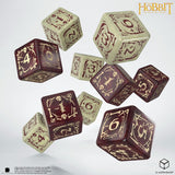 Set of dice with 'The Hobbit' branding on a white background