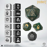 Set of dice with character symbols and 'The Hobbit' branding on a white background