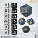 Set of dice with character symbols and 'The Hobbit' branding on a white background