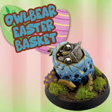 Owlbear Easter basket with a bear-like creature inside, on a colorful background.