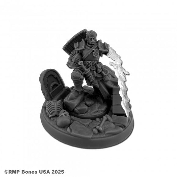 Gray miniature figurine with a sword on a white background