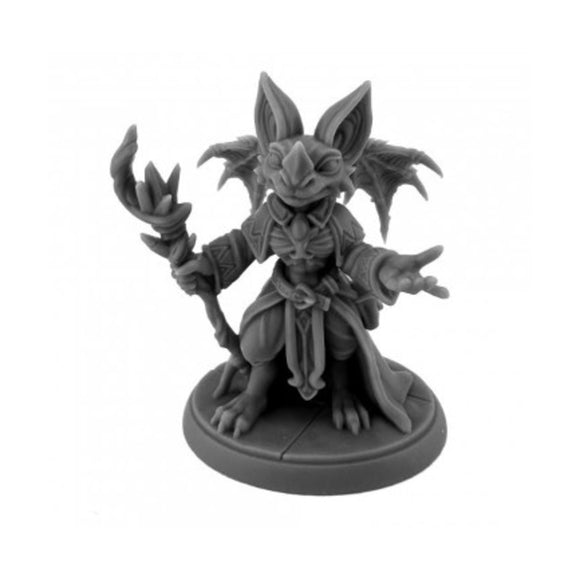Gray fantasy figurine on a white background