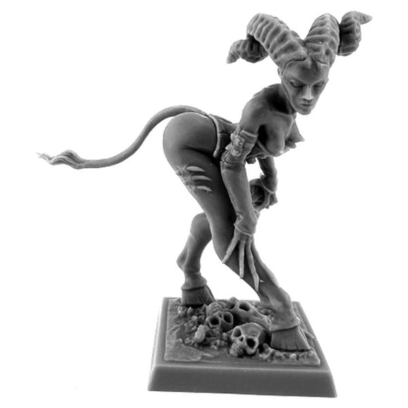 Gray figurine of a fantasy creature on a white background