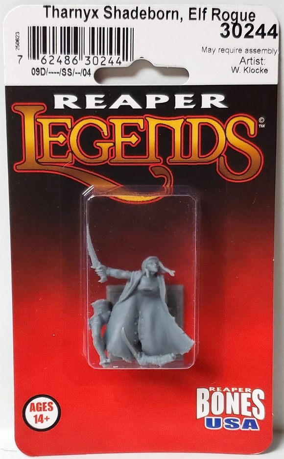Reaper Legends miniature figure packaging with a gray figure on a red background