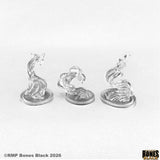 Three clear plastic dragon models on a white background with 'RMP Bones Black' branding.