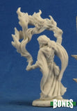 White figurine of a hooded figure with branches against a blue background, labeled 'BONES'.