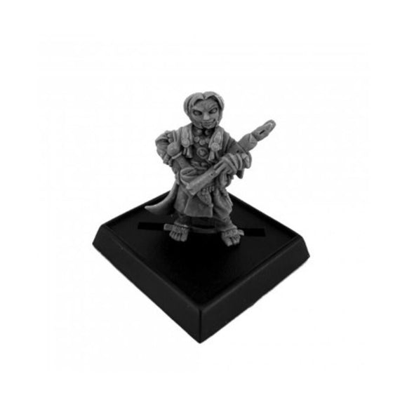 Gray miniature figurine on a black base against a white background