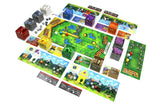 A colorful board game set arranged on a white background, featuring a large illustrated game board, multiple colored cube-like pieces, cards, tokens, and small game components.