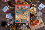 One-Page Rpgs 5 book on a table with snacks and drinks