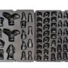 Set of dog bone-shaped molds on a black background