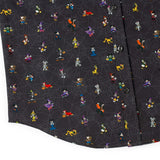 Patterned fabric with cartoon characters on a dark background