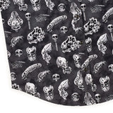 Black fabric with white skull and skeleton pattern