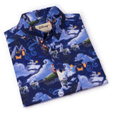 Folded shirt with Halloween-themed design featuring ghosts, pumpkins, and trick-or-treaters on a blue background.