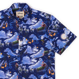 Shirt with festive design featuring characters and elements from a popular animated movie on a blue background.