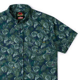 Green leaf-patterned shirt with 'Rip Curl' branding on a white background