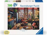 Ravensburger puzzle box with a cozy living room scene and 500 piece count.