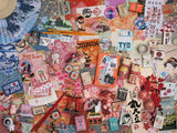 Collection of colorful Japanese-themed stickers and postcards on a textured surface.