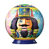 Colorful spherical puzzle with a nutcracker design on a white background